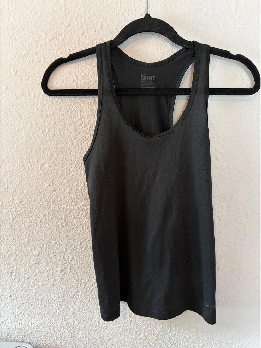 Nike Dri Fit black racerback tank size S. Logo is peeling slightly